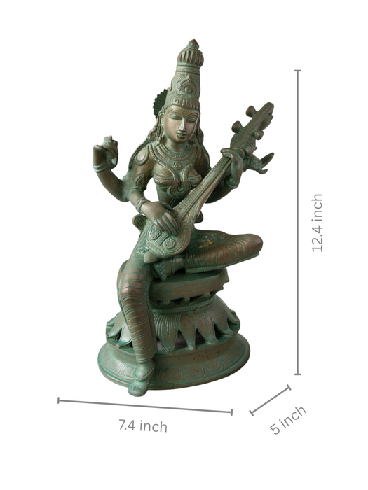 Maa Saraswati 
Brass Idol Sitting On Lotus Base