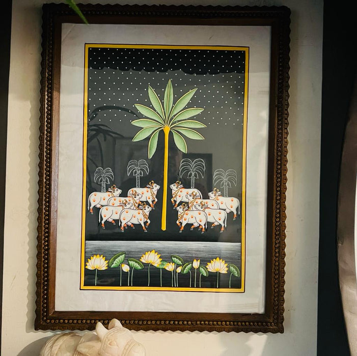 Mordern Pichwai Painting : Classic Pichwai Style painting of tradtitional motifs of cows and lotus (23.5inches, framed)
